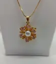 Collar con dije Floral Giratorio - Pétalos Rosa